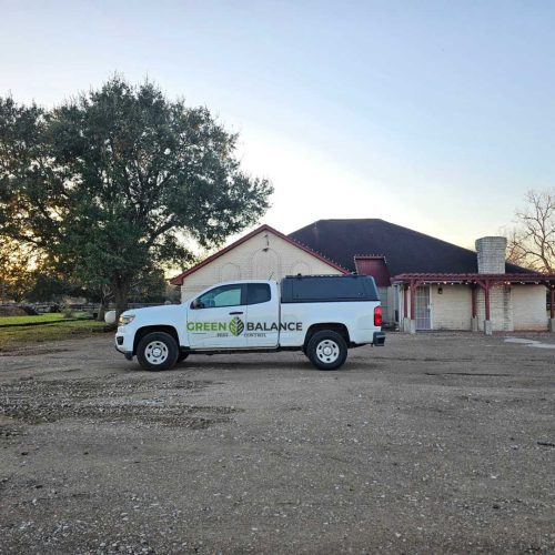 green balance pest control truck image